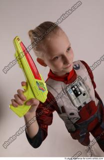 DENISA PILOT STANDING POSE WITH GUN 5